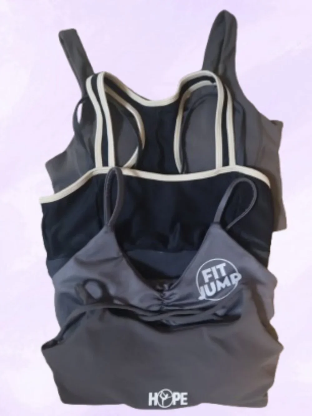 Bundle of 5 of xs's sports bras in burgundy, gray and blue. Sporty exercise work